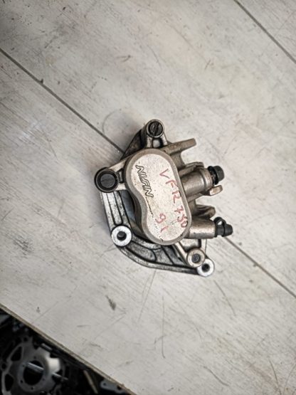 Суппорт с колодками Honda VFR750F (1990-1993)