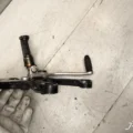 Кронштейн боковой подножки с рычагом КПП Yamaha R6 2003-2005